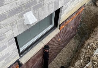 Drainage tube installed ready for window well