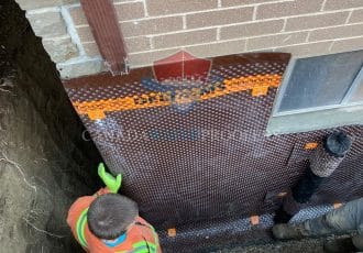 Drainage tube installed ready for window well