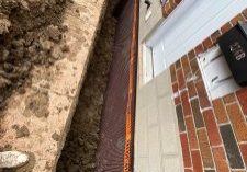 Excavated area for exterior waterproofing project