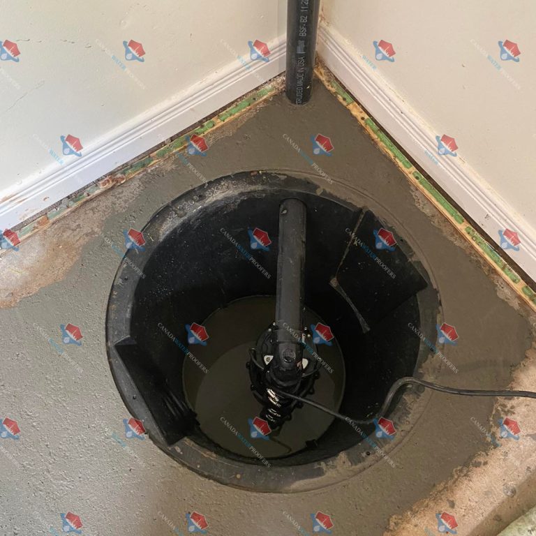 Sump pump installation in basement.