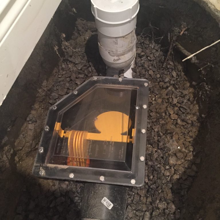 Backwater valve installation in ground