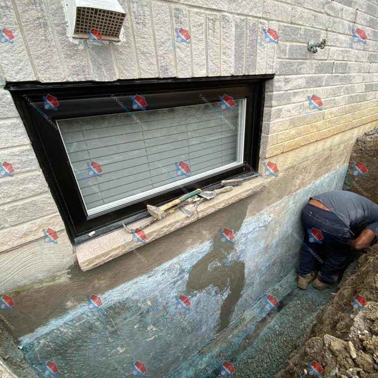 Window well installation in progress.