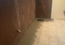 Basement waterproofing in progress.